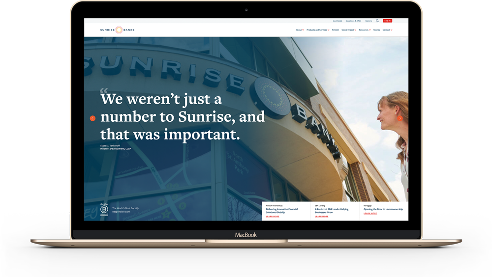 Sunrise Banks website displayed on a laptop.